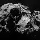 The comet seen from 28.5 km away. How those craters got there is still debated.